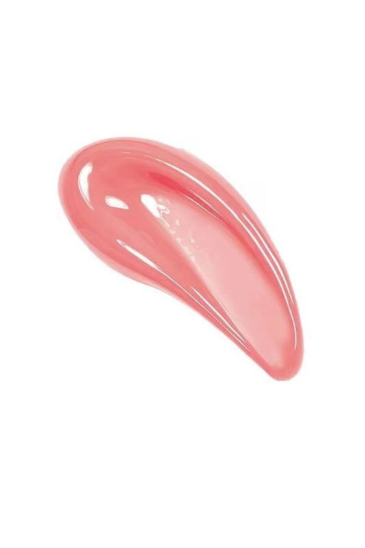 Honor the House Caribbean Sun Sweet Strawberry SPF 30 Lip Balm swatch featuring a glossy, light red tint. Vegan and cruelty-free lip protection for daily sun safety.