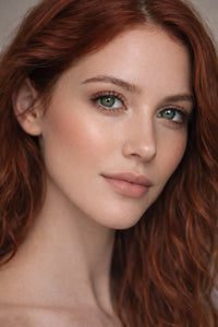 Chosen One vegan liquid foundation on a beautiful model with red hair and green eyes by Honor The House