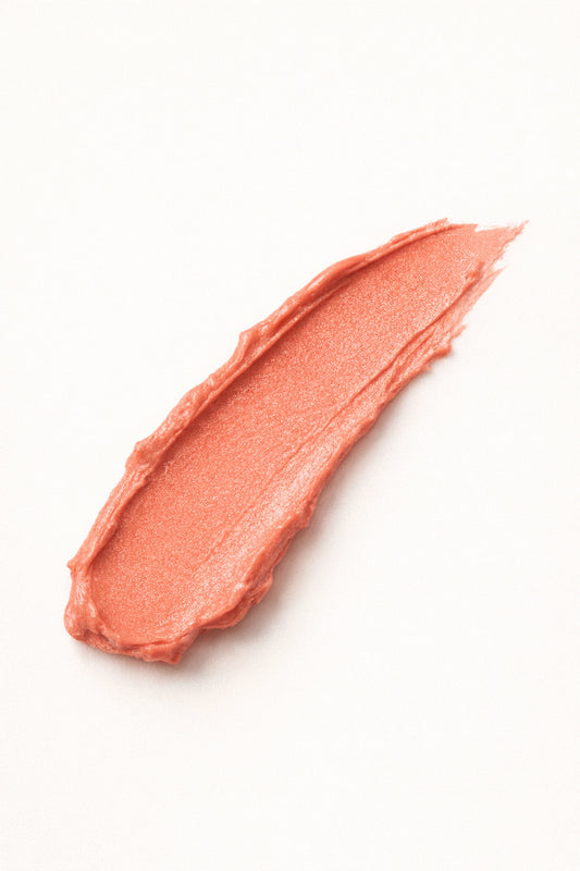 Honor the House Blush swatch shade 01 Sun Kiss - texture and color payoff of soft peach coral pigment.