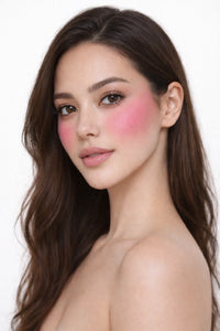 Honor The House Golden Cheek Cream Blush in 03 Brisa Rosa on model's cheeks.
