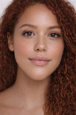 Golden Minute vegan liquid foundation on beautiful mixed model with reddish brown hair by Honor The House