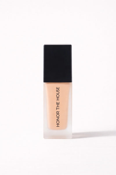 Golden Minute vegan liquid foundation in its original packaging by Honor The House