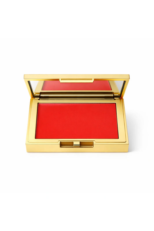 Honor the House Blush in shade 04 Solar Bloom - bright poppy red-orange shade in a luxury rectangular gold compact with mirror.
