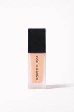 Sun Struck vegan liquid foundation in its original packaging by Honor The House 
