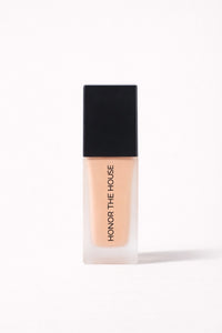 Sun Struck vegan liquid foundation in its original packaging by Honor The House 