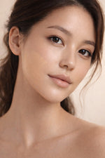 Honey Dipped vegan liquid foundation ob beautiful Asian model with brown hair by Honor The House