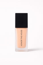 Honey Dipped vegan liquid foundation in its original packaging by Honor The House