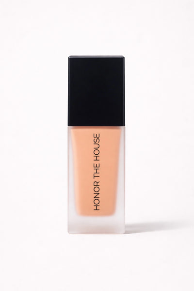 Warm Mirage vegan liquid foundation in its original packaging by Honor The House