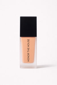 Desert Luck vegan liquid foundation in its original product packaging by Honor The House
