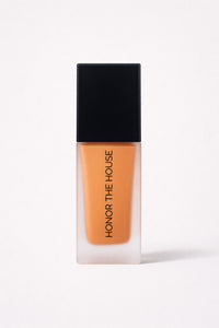 Amber Roulette vegan liquid foundation in its original packaging by Honor The House