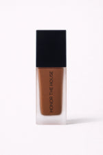Mocha Luxe vegan liquid foundation in its original packaging by Honor The House