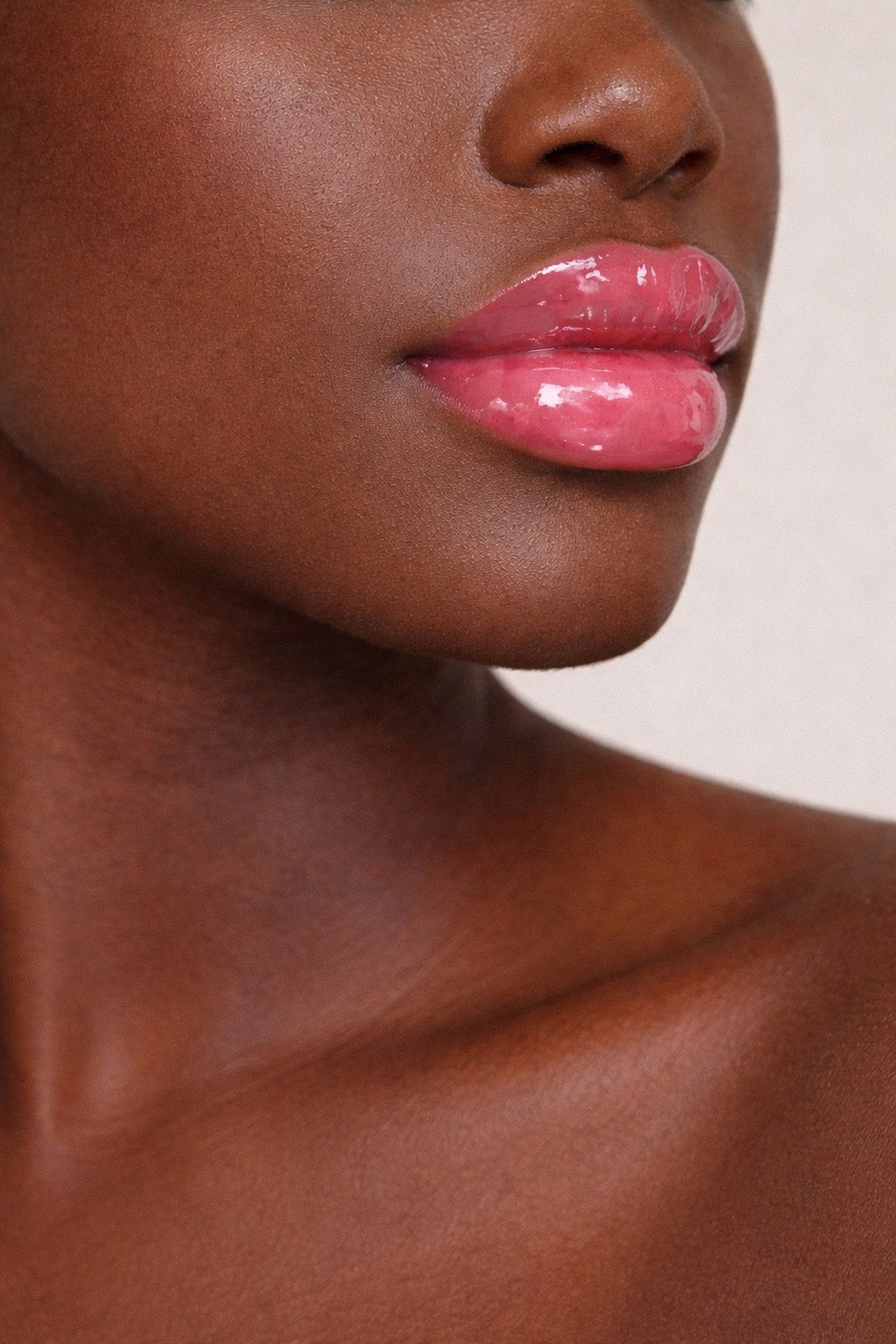 Honor The House SPF 30 Lip Balm in Cabernet Grape on Dark skin model lips.