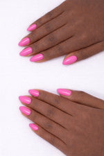 Bubble Gum Pink vegan nail polish on Ebony model hands by Honor The House