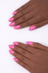 Bubble Gum Pink vegan nail polish on Ebony model hands by Honor The House