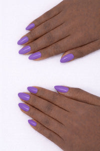 Royal Purple vegan nail polish on Ebony model hands by Honor The House