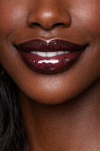 Honor The House Caribbean Sun SPF 30 French Vanilla on dark skin model.