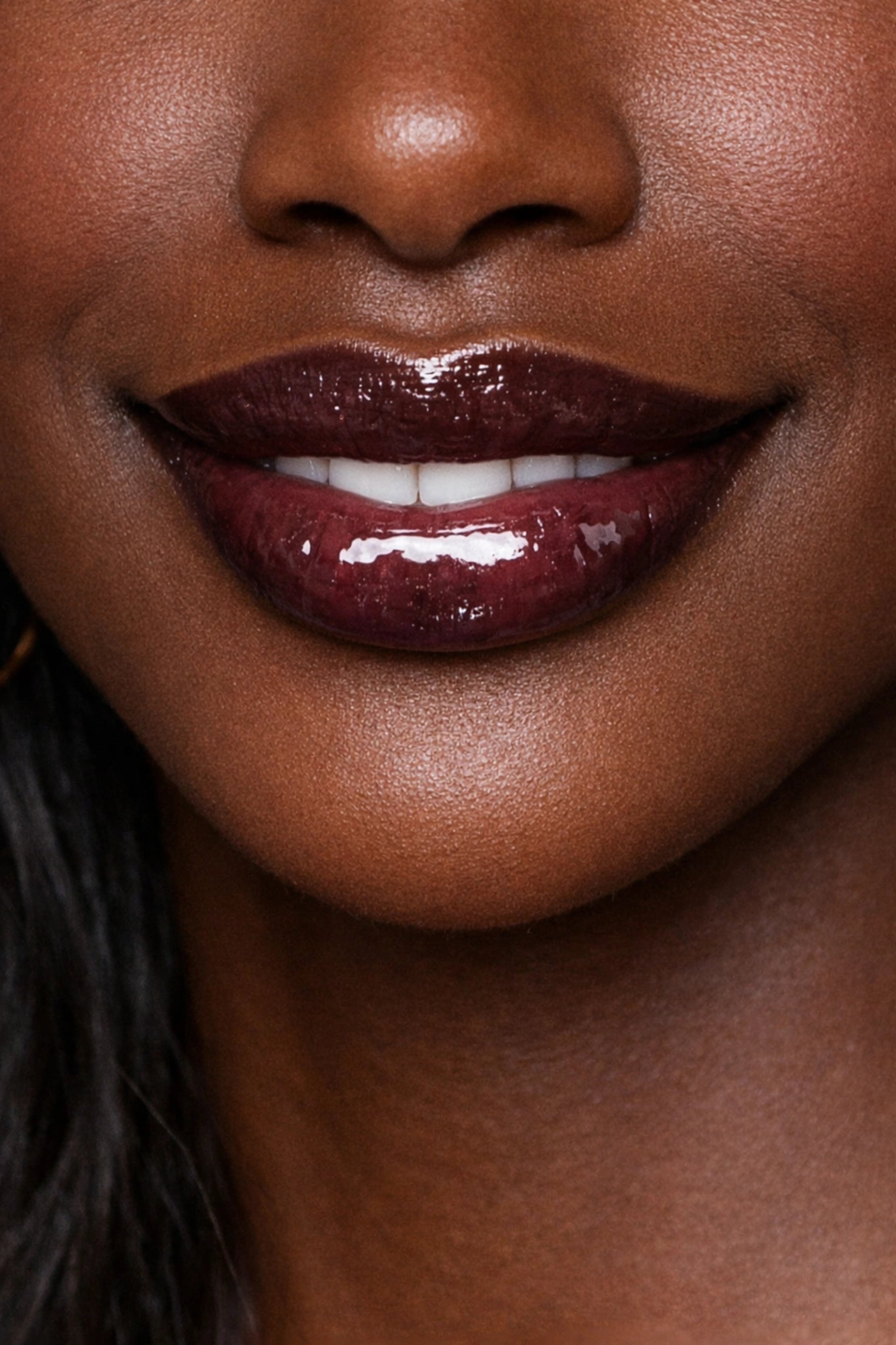 Honor The House Caribbean Sun SPF 30 French Vanilla on dark skin model.