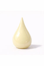 French Vanilla vegan nail polish in rain drop form by Honor The House