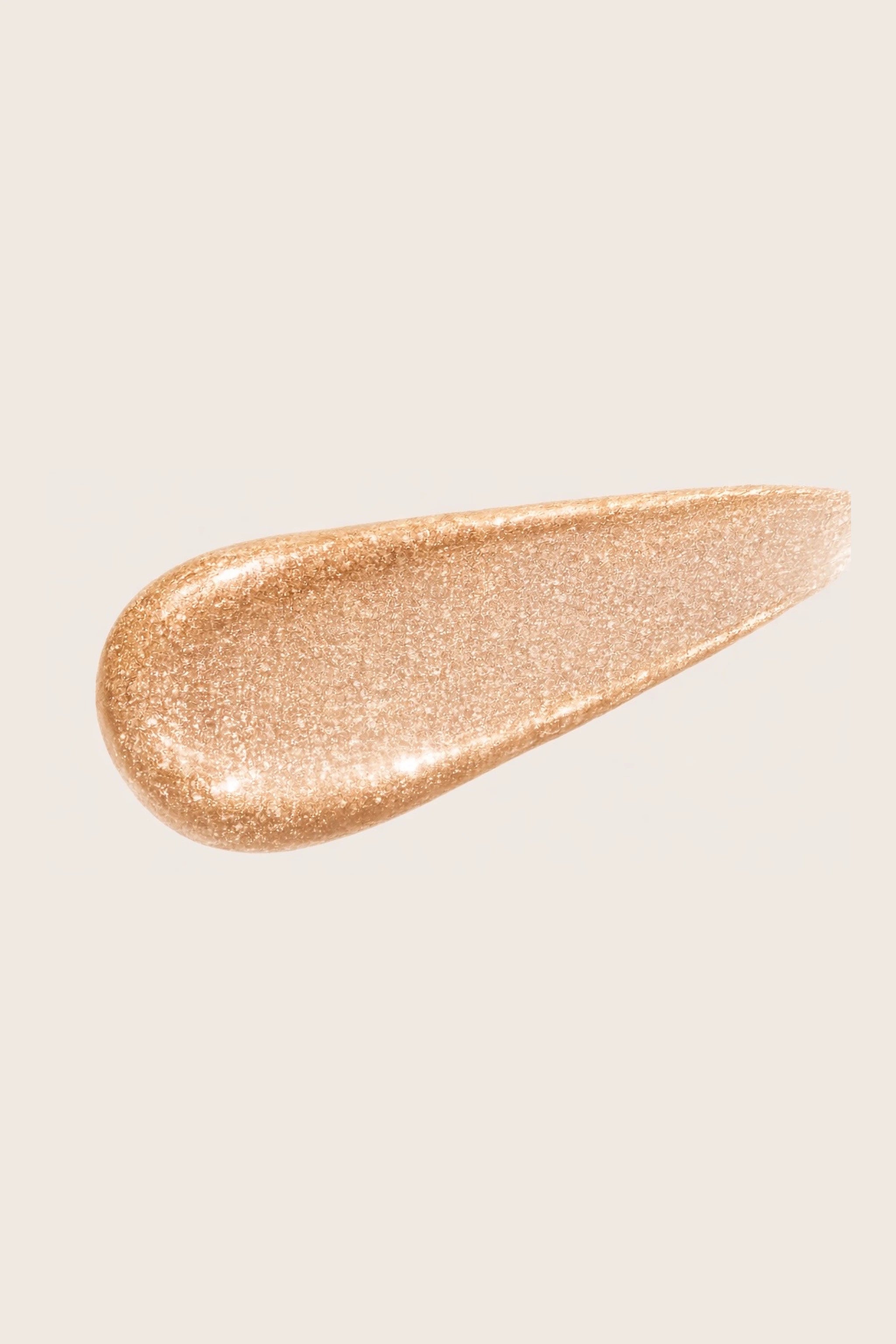 Honor The House Drippin' Gold Liquid Highlighter in Honey Soft Glow liquid swatch.