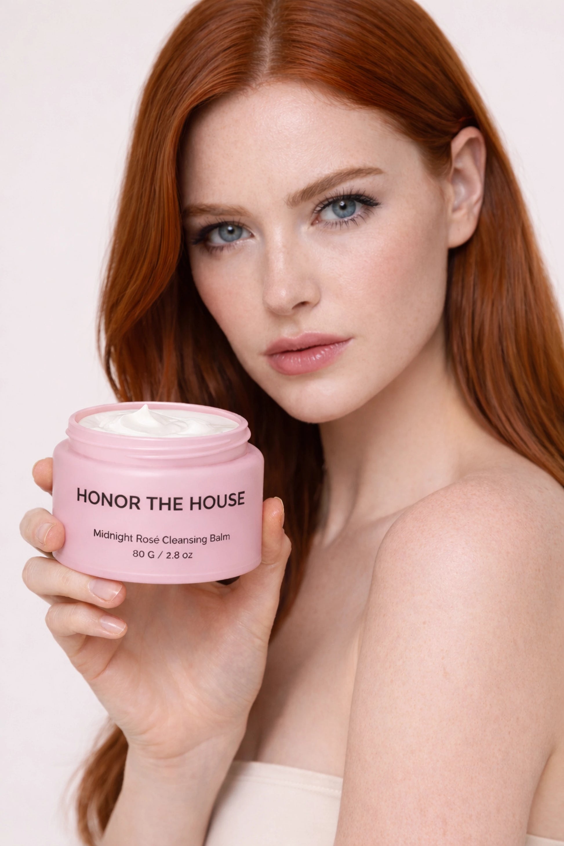 Creamy texture swatch of Midnight Rosé Makeup Remover Cleansing Balm by Honor The House, demonstrating the melting balm-to-oil consistency for deep pore cleansing.