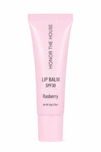 Honor The House Caribbean Sun SPF 30 Lip Balm Rum Raspberry flavor in its product packaging with off-white background.