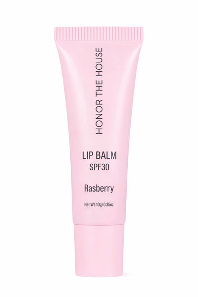 Honor The House Caribbean Sun SPF 30 Lip Balm Rum Raspberry flavor in its product packaging with off-white background.