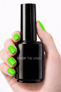 Umbreon Glow vegan nail polish on white model hands holding product bottle by Honor The House