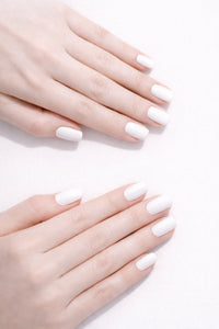 Cloud White vegan nail polish on white model hands by Honor The House