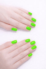 Umbreon Glow vegan nail polish on white model hands by Honor The House